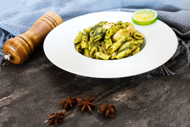 PESTO PASTA WITH ROASTED ASPARAGUS AND SUN-DRIED TOMATOES